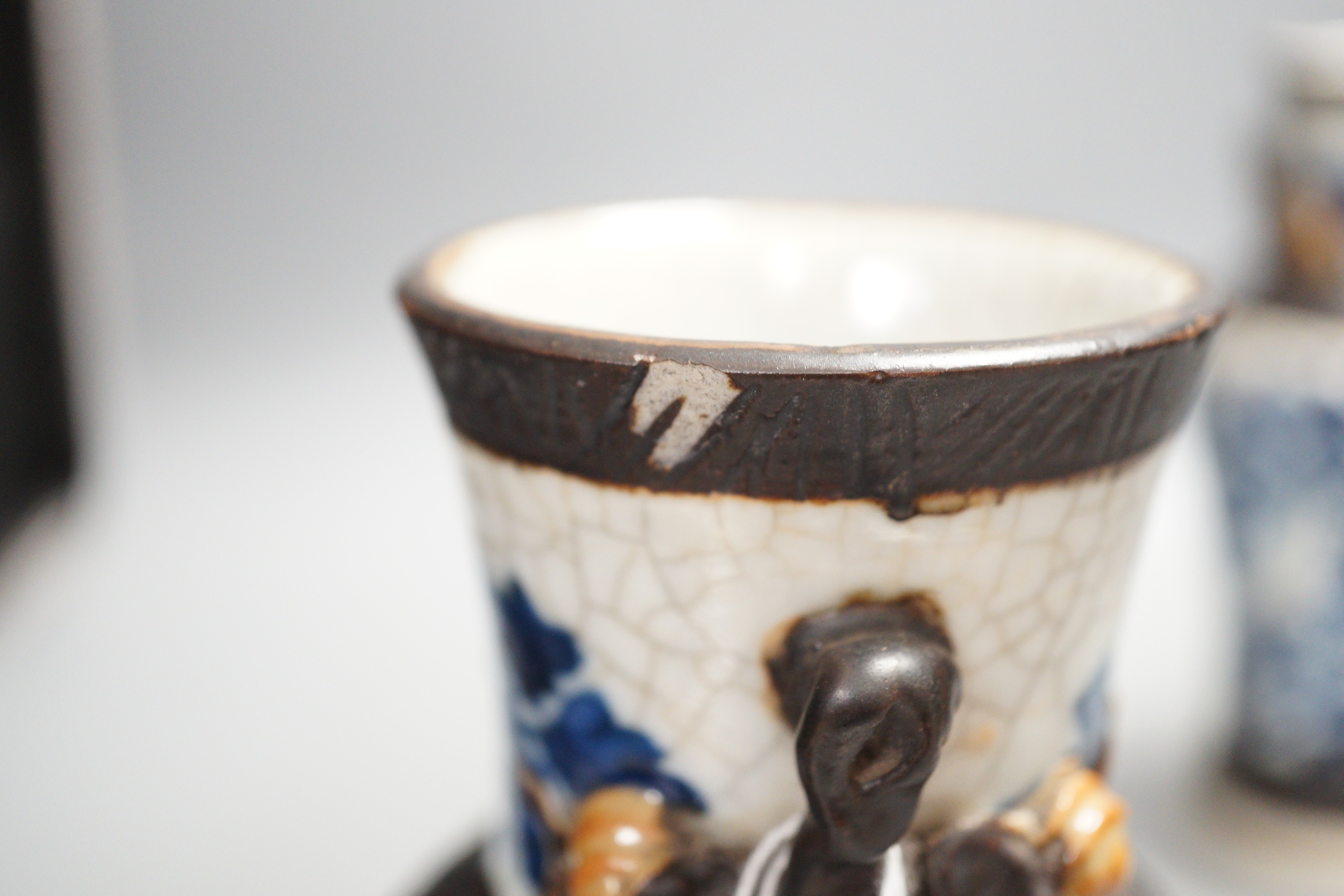A pair of late 19th century Chinese blue and white crackle glaze vases, 21cm